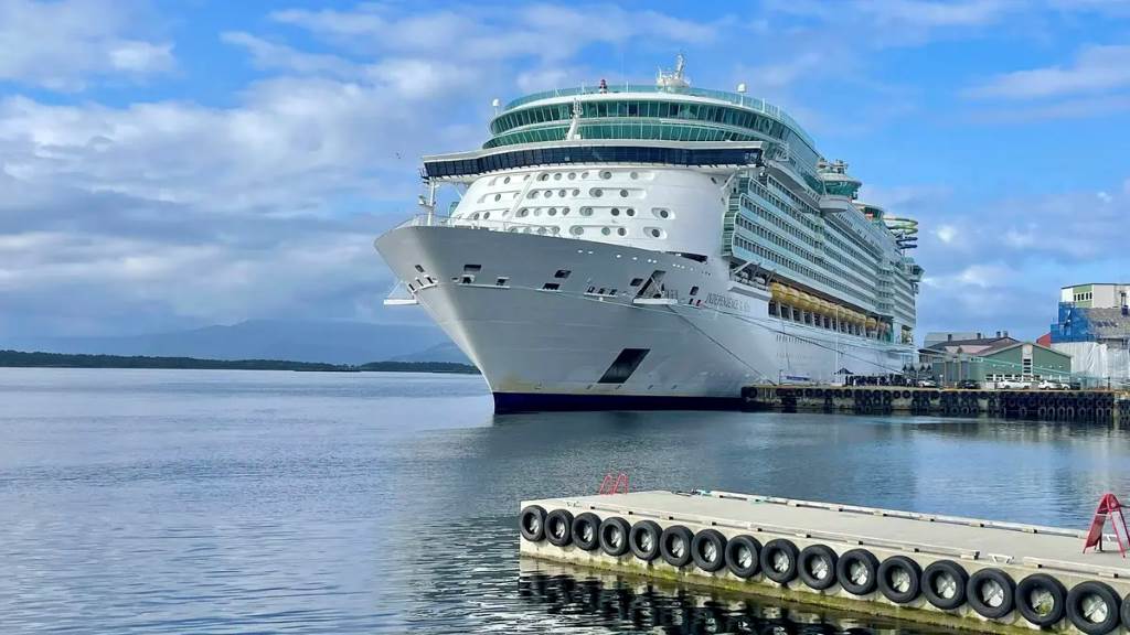 Royal Caribbean’s Independence of the Seas docked at a scenic port