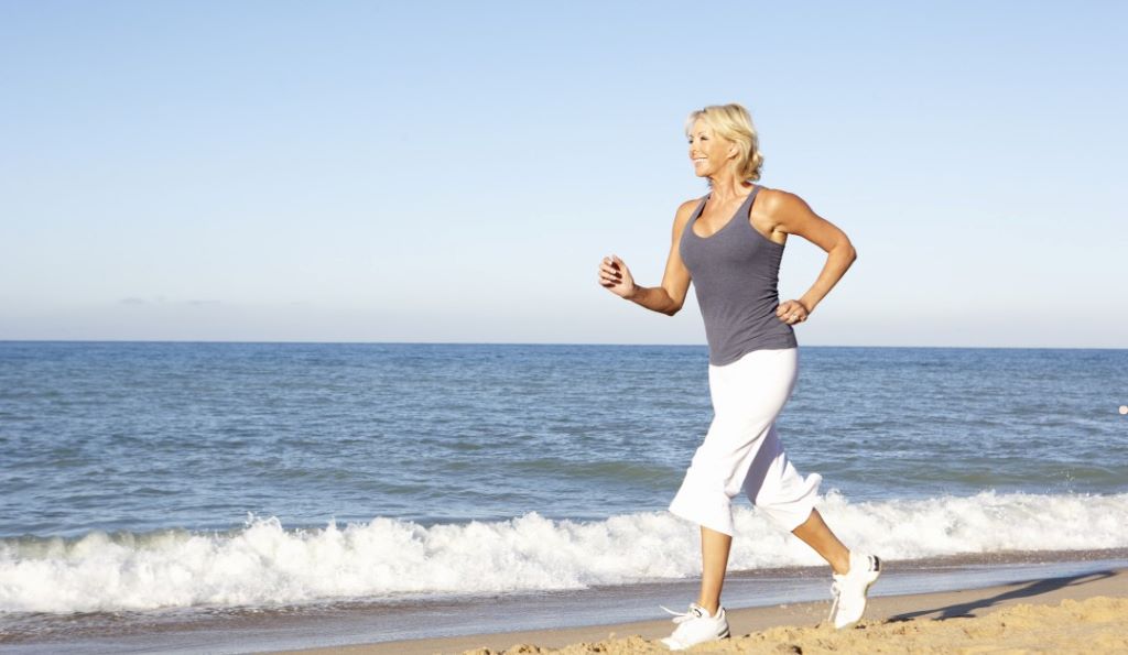 Person jogging outdoors in Texas while maintaining fitness on a trip